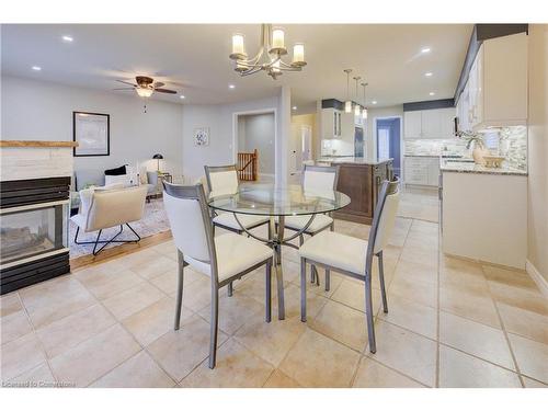 129 Dorchester Drive, Grimsby, ON - Indoor Photo Showing Dining Room With Fireplace