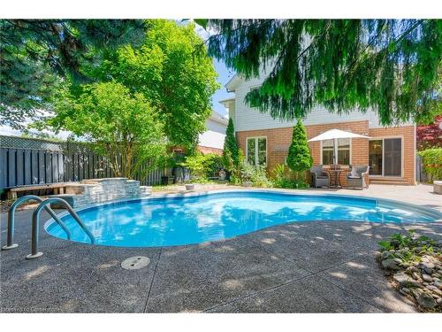 146 Kitty Murray Lane, Ancaster, ON - Outdoor With In Ground Pool With Backyard