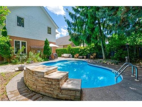 146 Kitty Murray Lane, Ancaster, ON - Outdoor With In Ground Pool With Backyard