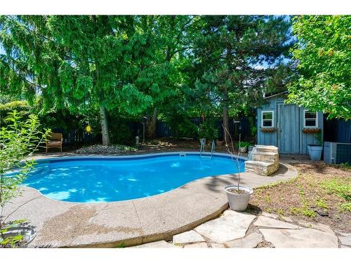 146 Kitty Murray Lane, Ancaster, ON - Outdoor With In Ground Pool