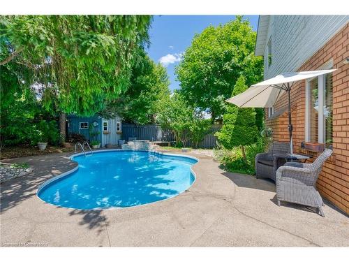 146 Kitty Murray Lane, Ancaster, ON - Outdoor With In Ground Pool