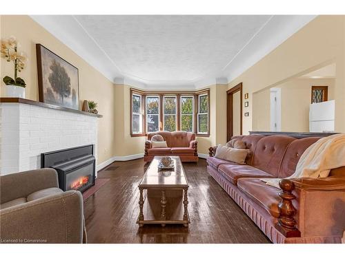 155 Walter Avenue S, Hamilton, ON - Indoor Photo Showing Living Room With Fireplace