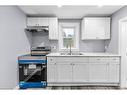 Main-30 Division Street, St. Catharines, ON  - Indoor Photo Showing Kitchen With Double Sink 