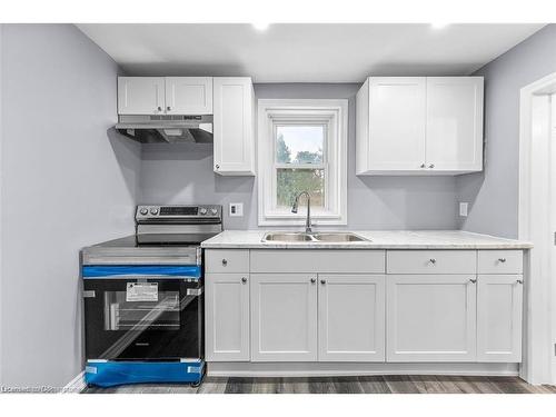 Main-30 Division Street, St. Catharines, ON - Indoor Photo Showing Kitchen With Double Sink