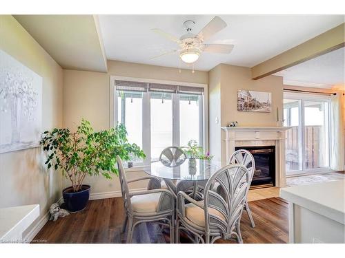 27-515 North Service Road, Stoney Creek, ON - Indoor Photo Showing Dining Room With Fireplace