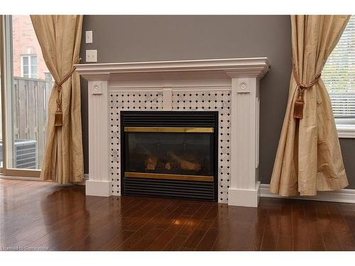 11-25 Hamilton Street South Street, Waterdown, ON - Indoor Photo Showing Living Room With Fireplace