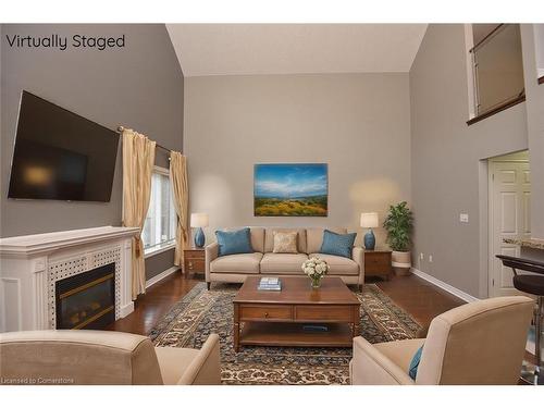 11-25 Hamilton Street South Street, Waterdown, ON - Indoor Photo Showing Living Room With Fireplace