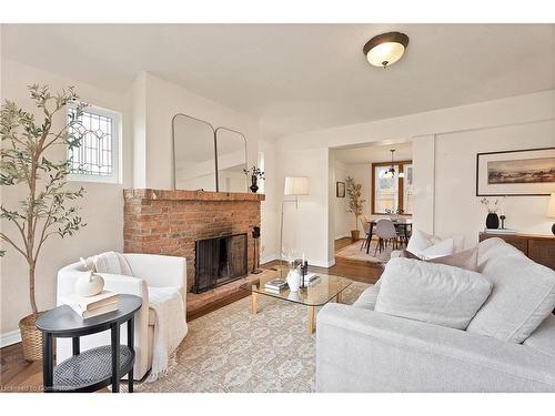 295 Plains Road W, Burlington, ON - Indoor Photo Showing Living Room With Fireplace