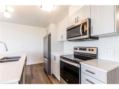 404-479 Charlton Avenue E, Hamilton, ON - Indoor Photo Showing Kitchen With Stainless Steel Kitchen With Double Sink