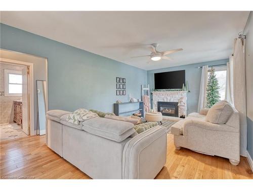 99 East 36Th Street, Hamilton, ON - Indoor Photo Showing Living Room With Fireplace