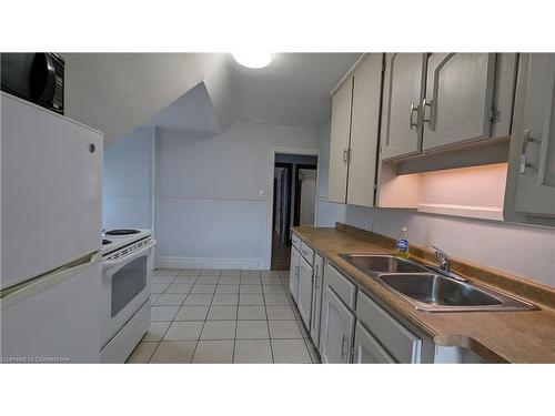 3-157 Herkimer Street, Hamilton, ON - Indoor Photo Showing Kitchen With Double Sink