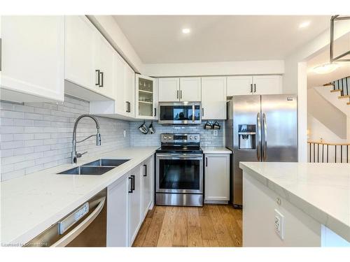 7-5110 Fairview Street, Burlington, ON - Indoor Photo Showing Kitchen With Stainless Steel Kitchen With Double Sink With Upgraded Kitchen