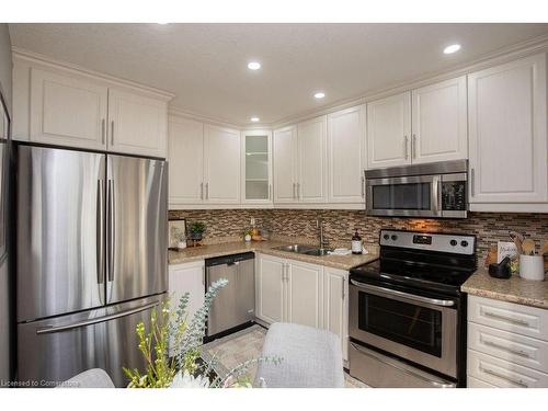 Main Lvl-551 Barnaby Street, Hamilton, ON - Indoor Photo Showing Kitchen With Double Sink With Upgraded Kitchen