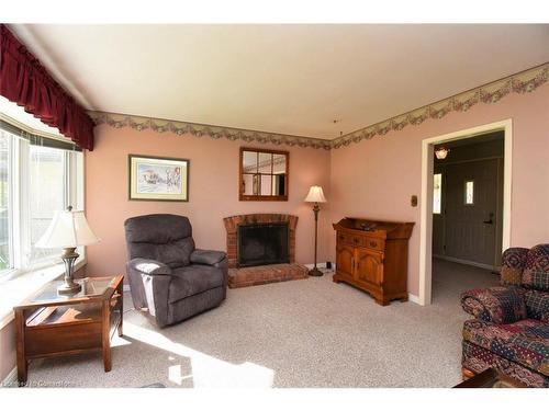 18 Pleasant Avenue, Dundas, ON - Indoor Photo Showing Living Room With Fireplace