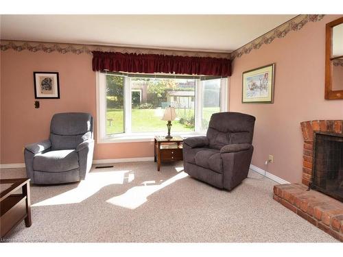 18 Pleasant Avenue, Dundas, ON - Indoor Photo Showing Living Room With Fireplace