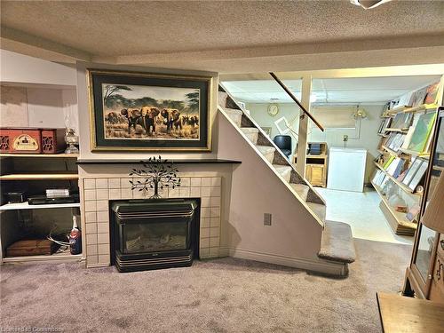 28 Cameron Avenue, Hamilton, ON - Indoor Photo Showing Living Room With Fireplace