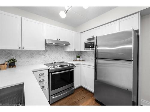 210-2055 Appleby Line, Burlington, ON - Indoor Photo Showing Kitchen With Stainless Steel Kitchen With Upgraded Kitchen