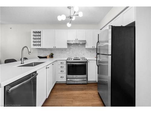 210-2055 Appleby Line, Burlington, ON - Indoor Photo Showing Kitchen With Stainless Steel Kitchen With Upgraded Kitchen