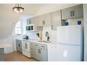 3-39 Stanley Avenue, Hamilton, ON  - Indoor Photo Showing Kitchen With Double Sink 