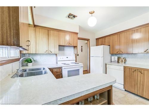 69 Orphir Road, Hamilton, ON - Indoor Photo Showing Kitchen With Double Sink