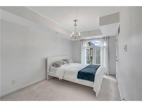 401-3060 Rotary Way, Burlington, ON - Indoor Photo Showing Bedroom