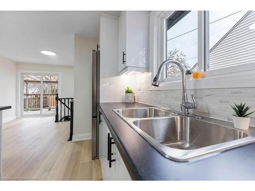 295 Glennie Avenue, Hamilton, ON - Indoor Photo Showing Kitchen With Double Sink