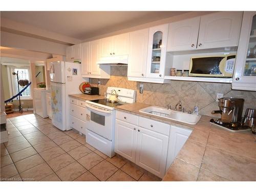 25 Chatham Street, Hamilton, ON - Indoor Photo Showing Kitchen With Double Sink