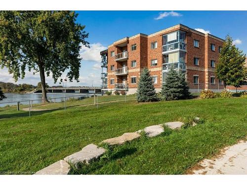 107-210 Main Street E, Dunnville, ON - Outdoor With Balcony With Facade