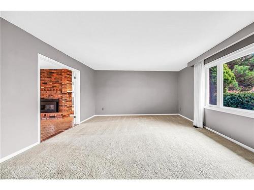 1281 Abbey Court, Burlington, ON - Indoor Photo Showing Other Room With Fireplace