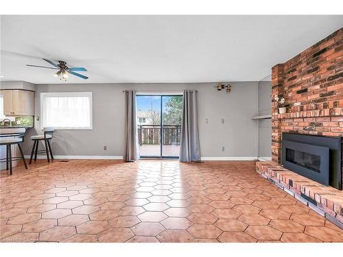 1281 Abbey Court, Burlington, ON - Indoor Photo Showing Living Room With Fireplace