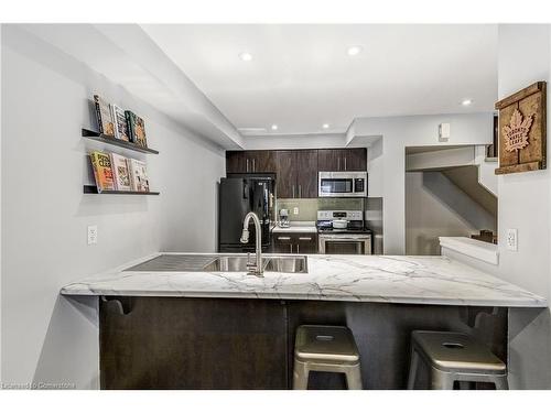 18-362 Plains Road E, Burlington, ON - Indoor Photo Showing Kitchen With Double Sink With Upgraded Kitchen