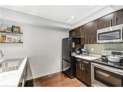 18-362 Plains Road E, Burlington, ON - Indoor Photo Showing Kitchen With Double Sink