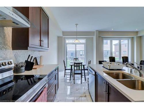 14 Ellis Avenue, Caledonia, ON - Indoor Photo Showing Kitchen With Double Sink With Upgraded Kitchen