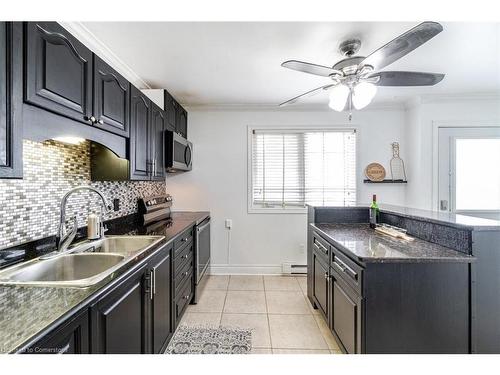 2-55 Blandford Street, Woodstock, ON - Indoor Photo Showing Kitchen With Double Sink