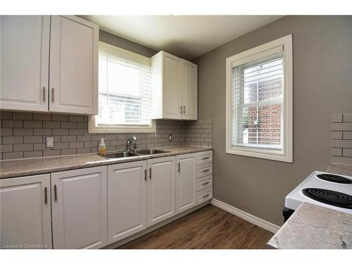 174 East 12Th Street, Hamilton, ON - Indoor Photo Showing Kitchen With Double Sink