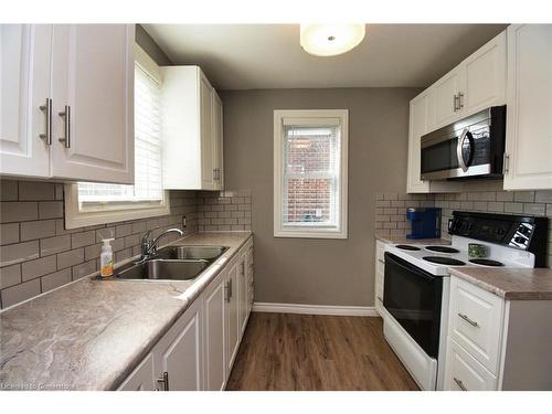 174 East 12Th Street, Hamilton, ON - Indoor Photo Showing Kitchen With Double Sink