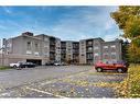 402-10 John Street, Grimsby, ON  - Outdoor With Balcony With Facade 