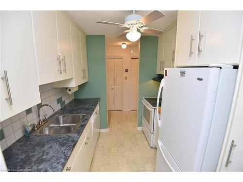 402-10 John Street, Grimsby, ON - Indoor Photo Showing Kitchen With Double Sink