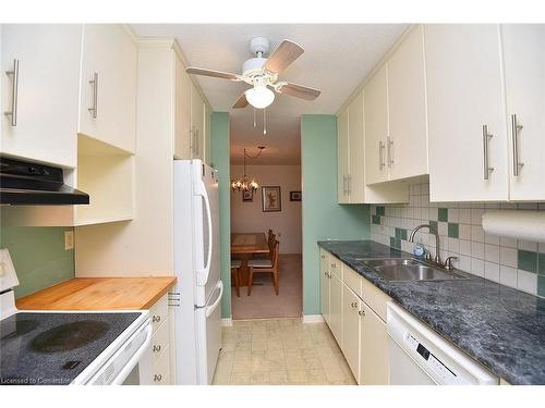 402-10 John Street, Grimsby, ON - Indoor Photo Showing Kitchen With Double Sink