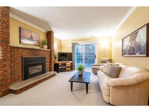 3 San Paulo Drive, Hamilton, ON - Indoor Photo Showing Living Room With Fireplace