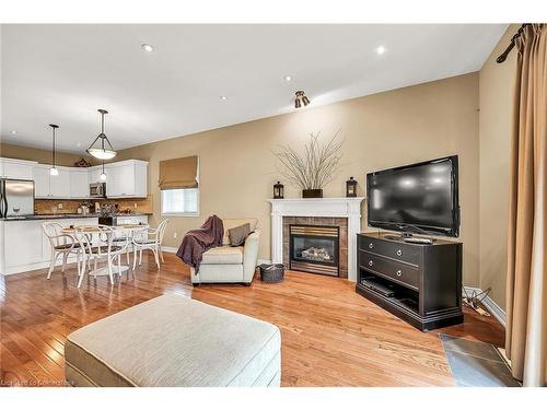 4531 Frances Crescent, Beamsville, ON - Indoor Photo Showing Living Room With Fireplace