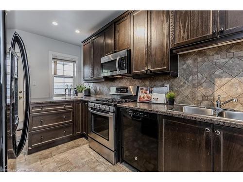 49 Tisdale Street S, Hamilton, ON - Indoor Photo Showing Kitchen With Double Sink