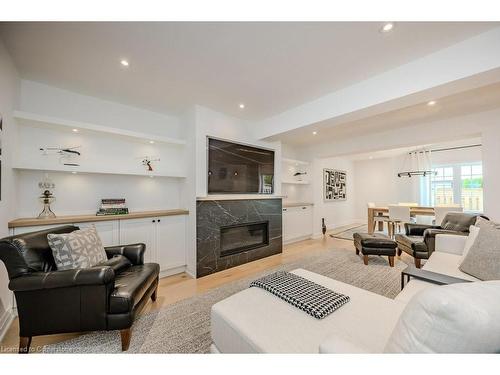 6-3333 New Street, Burlington, ON - Indoor Photo Showing Living Room With Fireplace