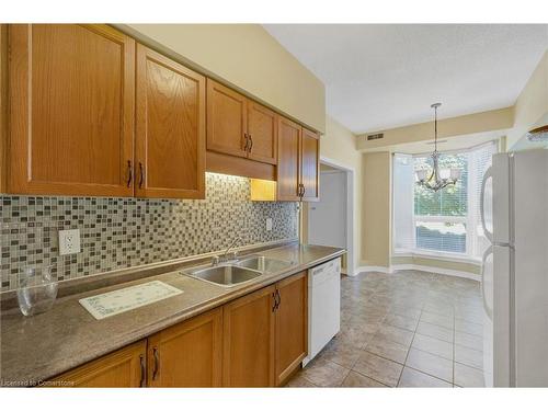 109-416 Limeridge Road E, Hamilton, ON - Indoor Photo Showing Kitchen With Double Sink