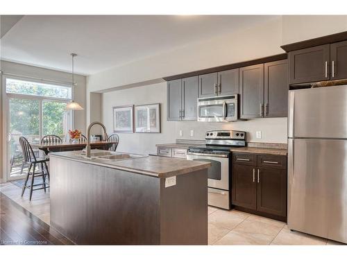 42 Oakhaven Place, Ancaster, ON - Indoor Photo Showing Kitchen With Stainless Steel Kitchen With Double Sink With Upgraded Kitchen