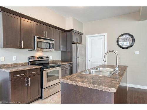 42 Oakhaven Place, Ancaster, ON - Indoor Photo Showing Kitchen With Stainless Steel Kitchen With Double Sink With Upgraded Kitchen