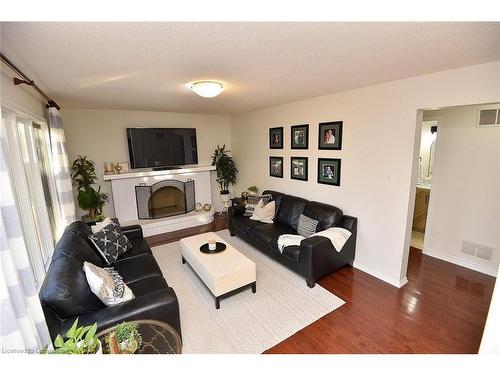 570 Harmony Avenue, Burlington, ON - Indoor Photo Showing Living Room With Fireplace