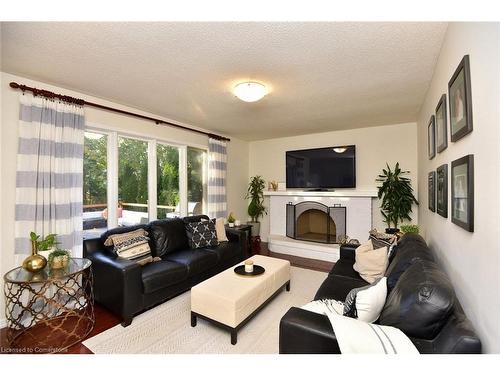 570 Harmony Avenue, Burlington, ON - Indoor Photo Showing Living Room With Fireplace