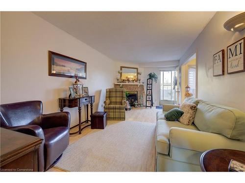 180 Dicenzo Drive, Hamilton, ON - Indoor Photo Showing Living Room With Fireplace