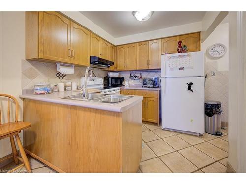 180 Dicenzo Drive, Hamilton, ON - Indoor Photo Showing Kitchen With Double Sink